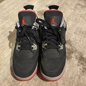 Nike Air Jordan 4 Retro Bred. Worn twice. Excellent condition. 7Y.